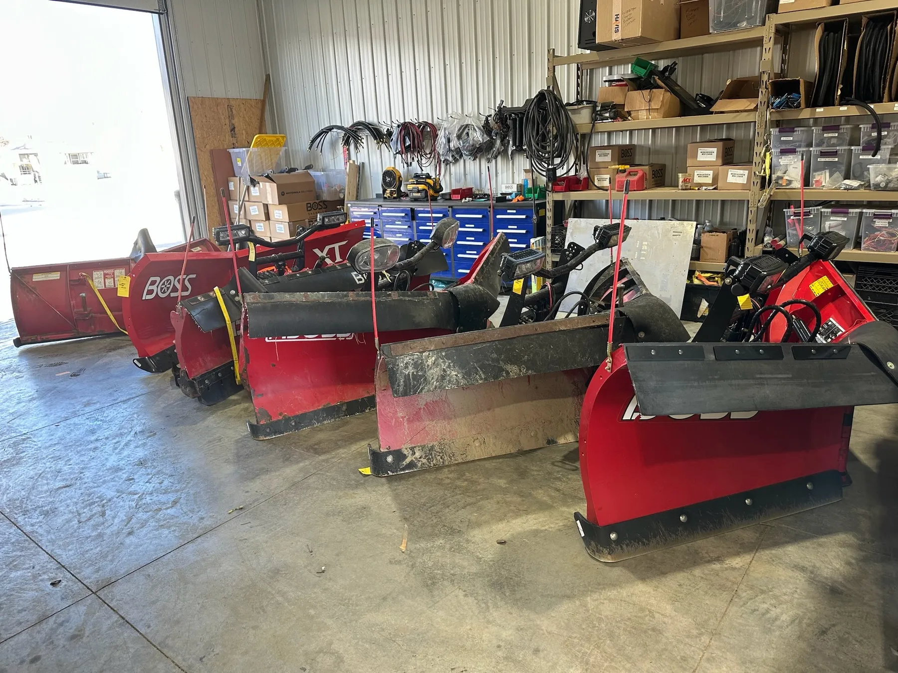 BOSS snow plows ready for installation at Elite Vehicle Outfitters
