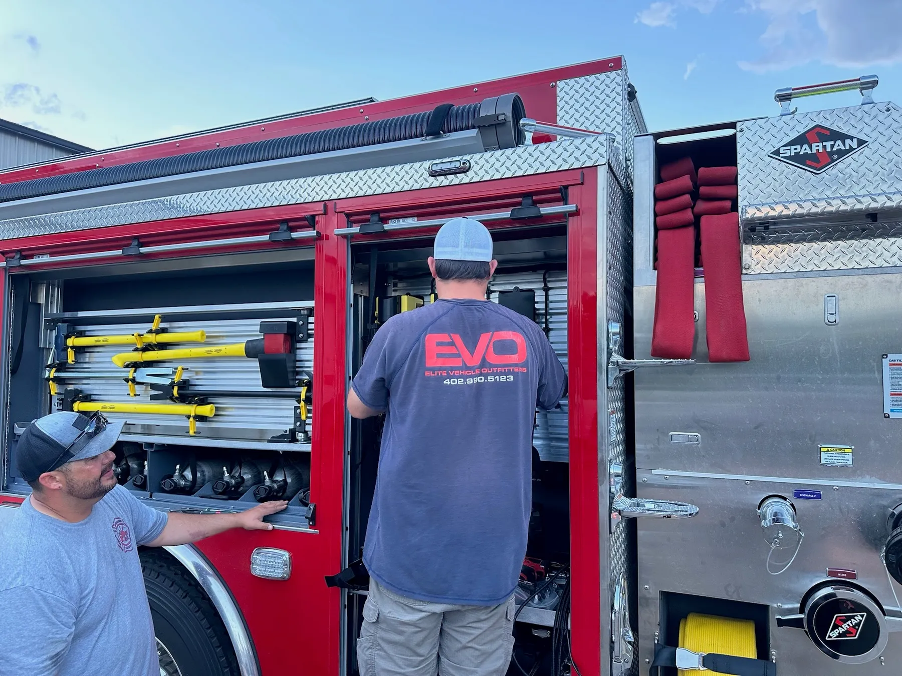 Elite Vehicle Outfitters technician servicing a fire apparatus