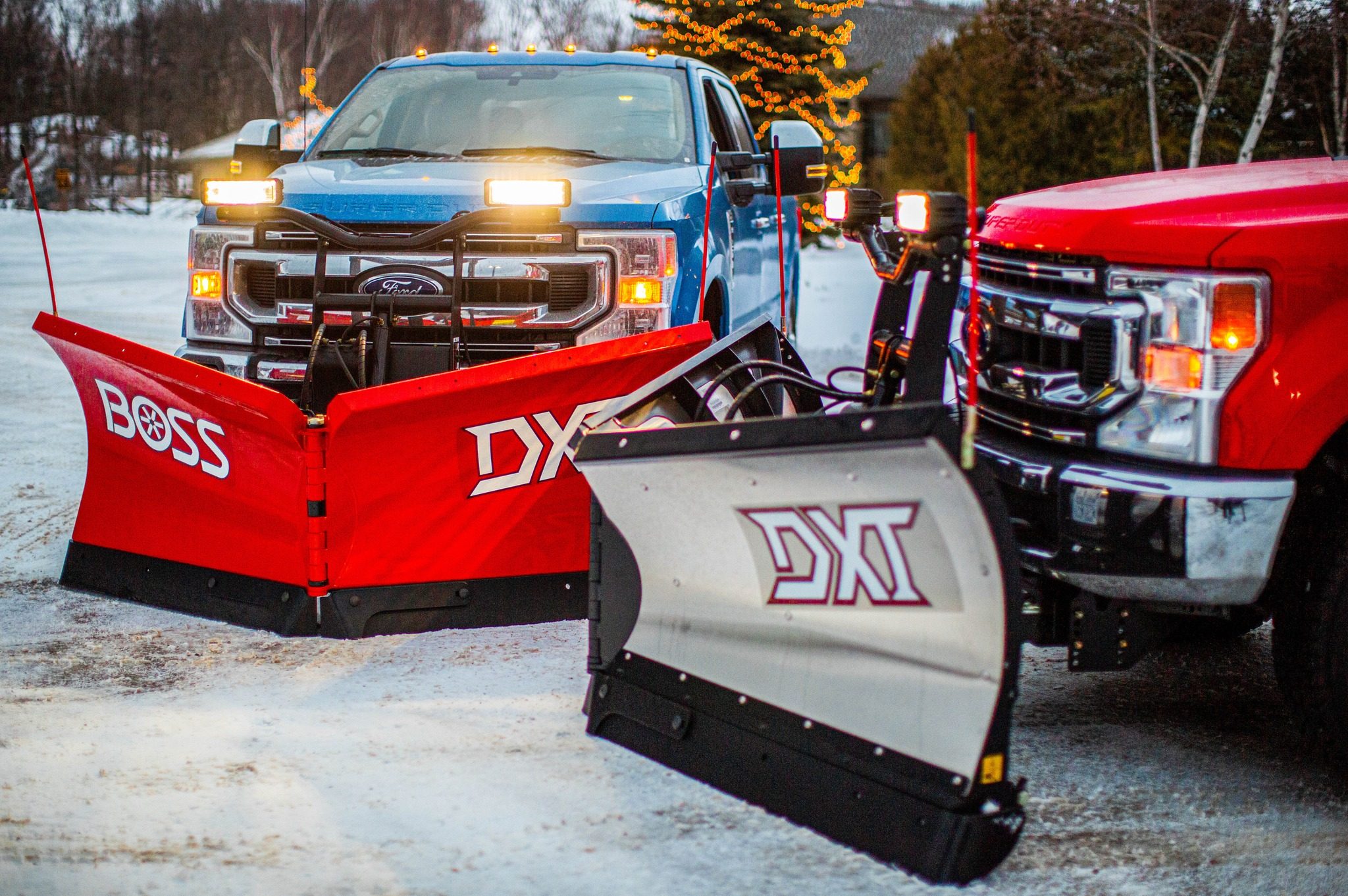 Heavy duty truck with BOSS snow plow installation for commercial snow removal