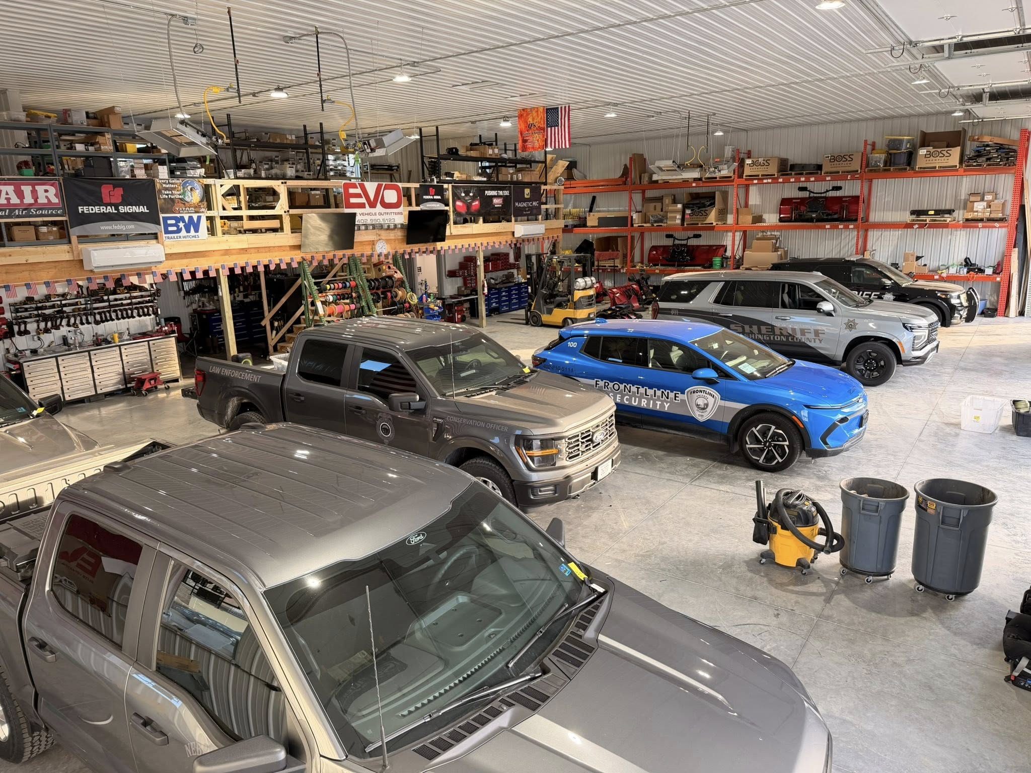 Inside Elite Vehicle Outfitters fleet and emergency vehicle installation facility in Nebraska