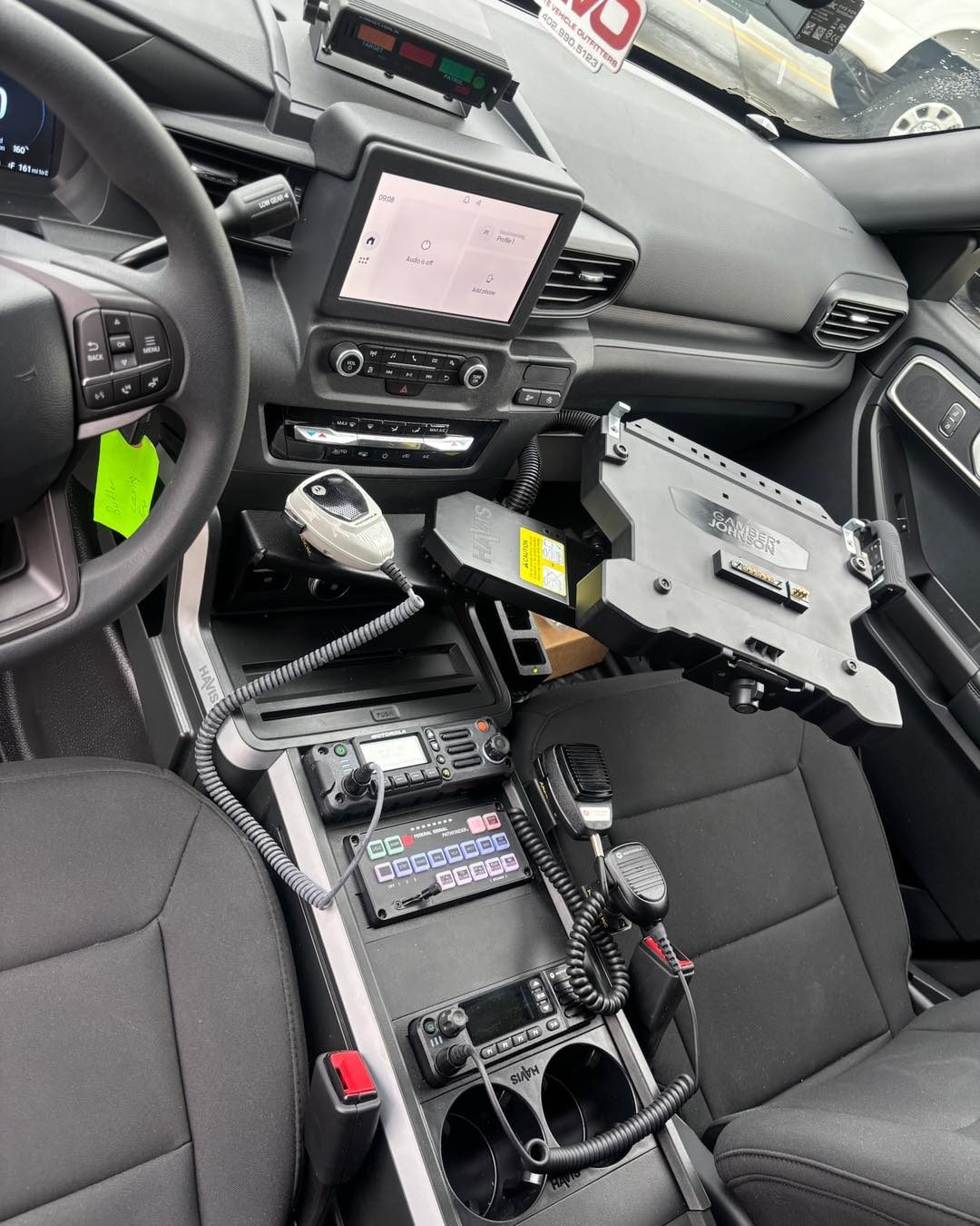 Police vehicle command center interior with communication and emergency equipment installation